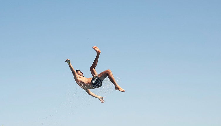 Man flying off a water slide