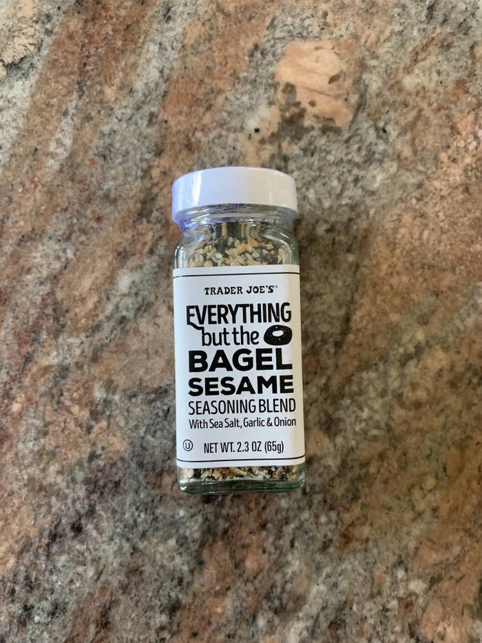 A bottle of the sesame blend laying on a countertop