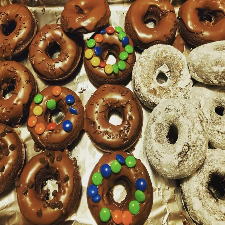 donuts decorated with icing and candy