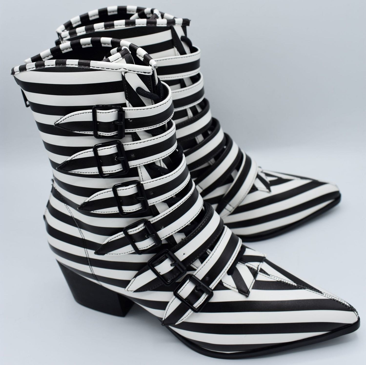 black and white striped shoe with a pointy toe