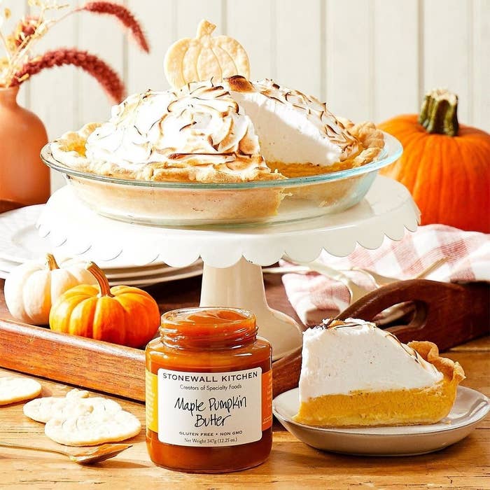 The maple pumpkin butter in front of a pumpkin pie