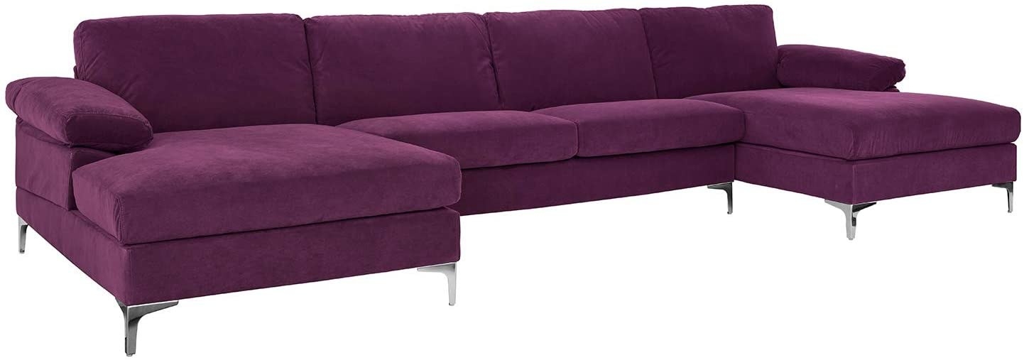 An eggplant purple colored couch