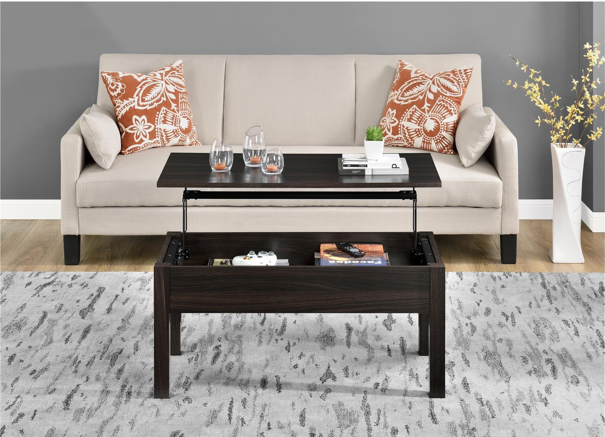 the dark wood coffee table in a living room