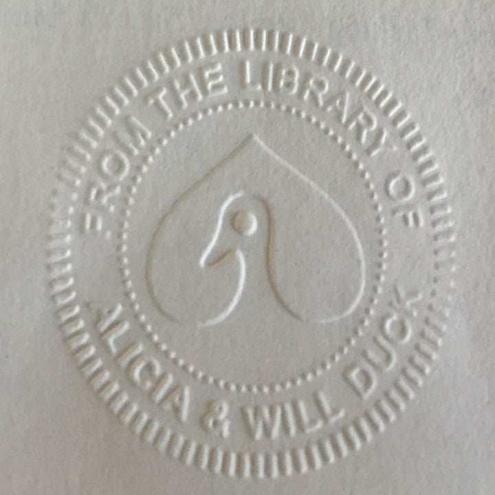 reviewer photo of the personalized stamp left by the embosser