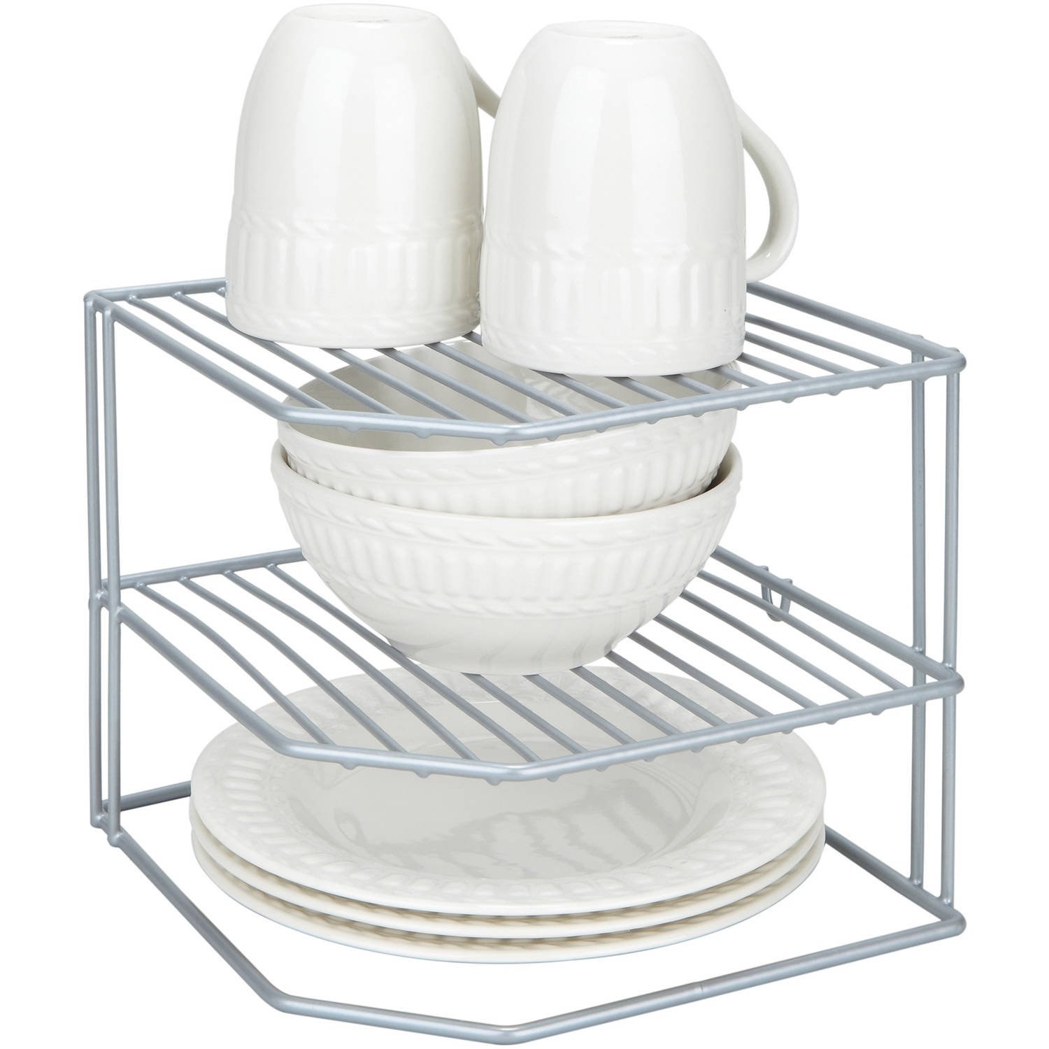 the silver organizer with white dishes