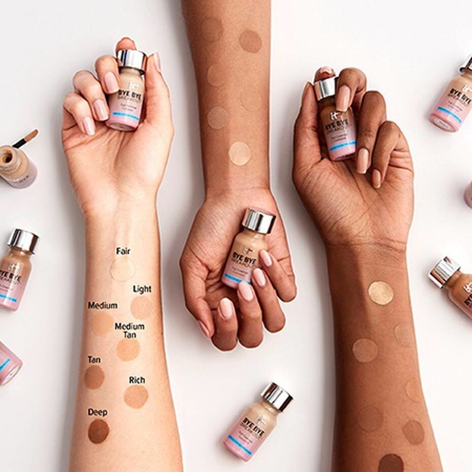 three models&#x27; forearms with concealer swatched on them