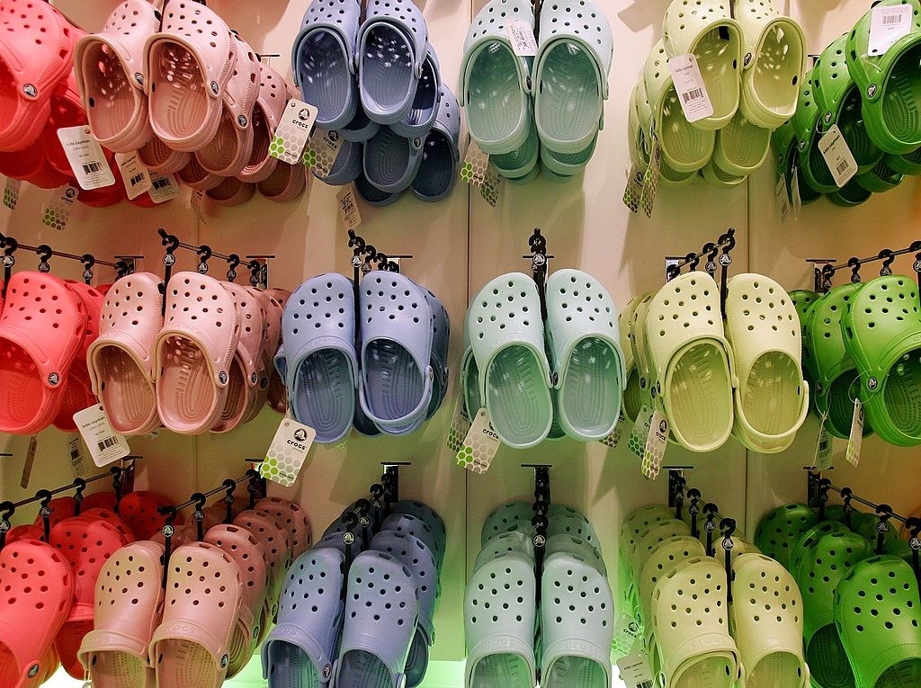 A wall of pastel crocs