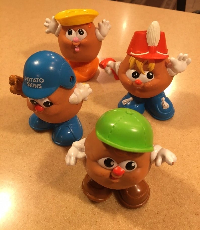 Four different Potato Kids toys