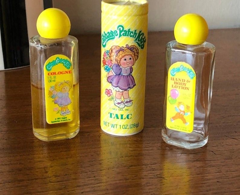 A bottle of Cabbage Patch Kids&#x27; cologne, talc, and a hand and body lotion