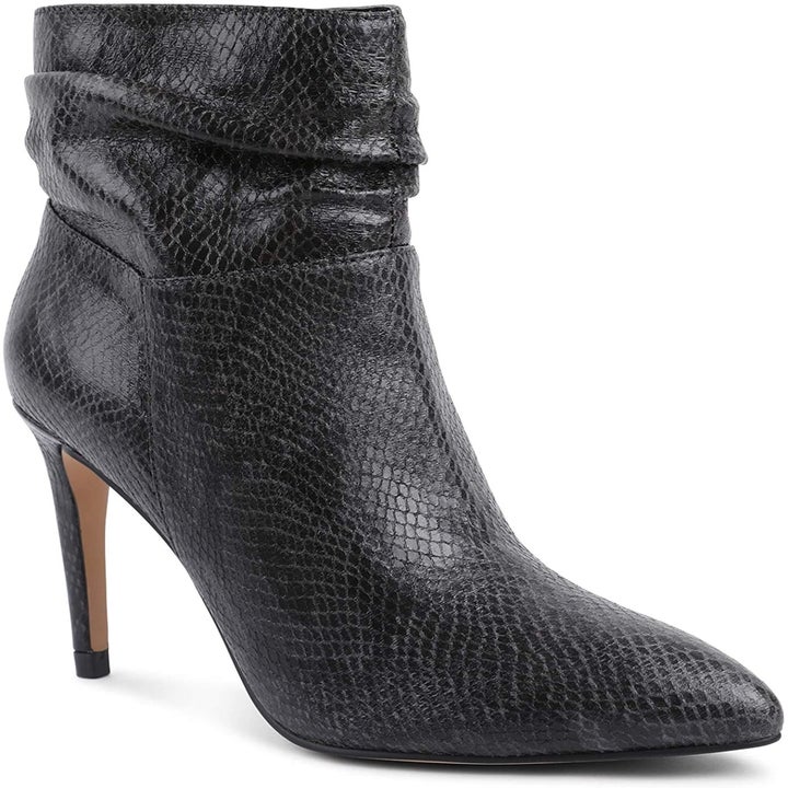 the booties with a gray snake skin pattern