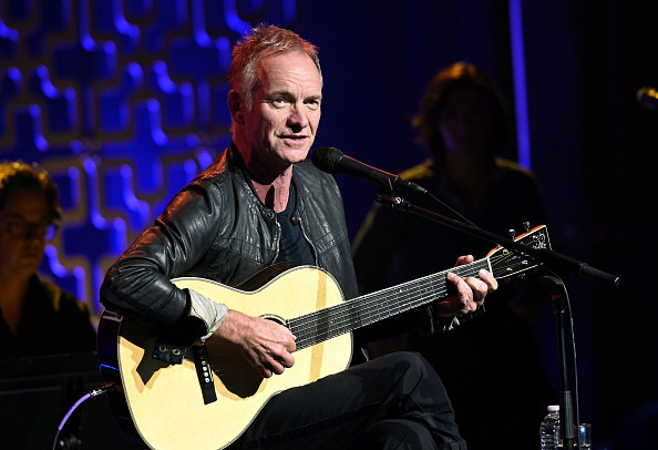 Sting playing guitar