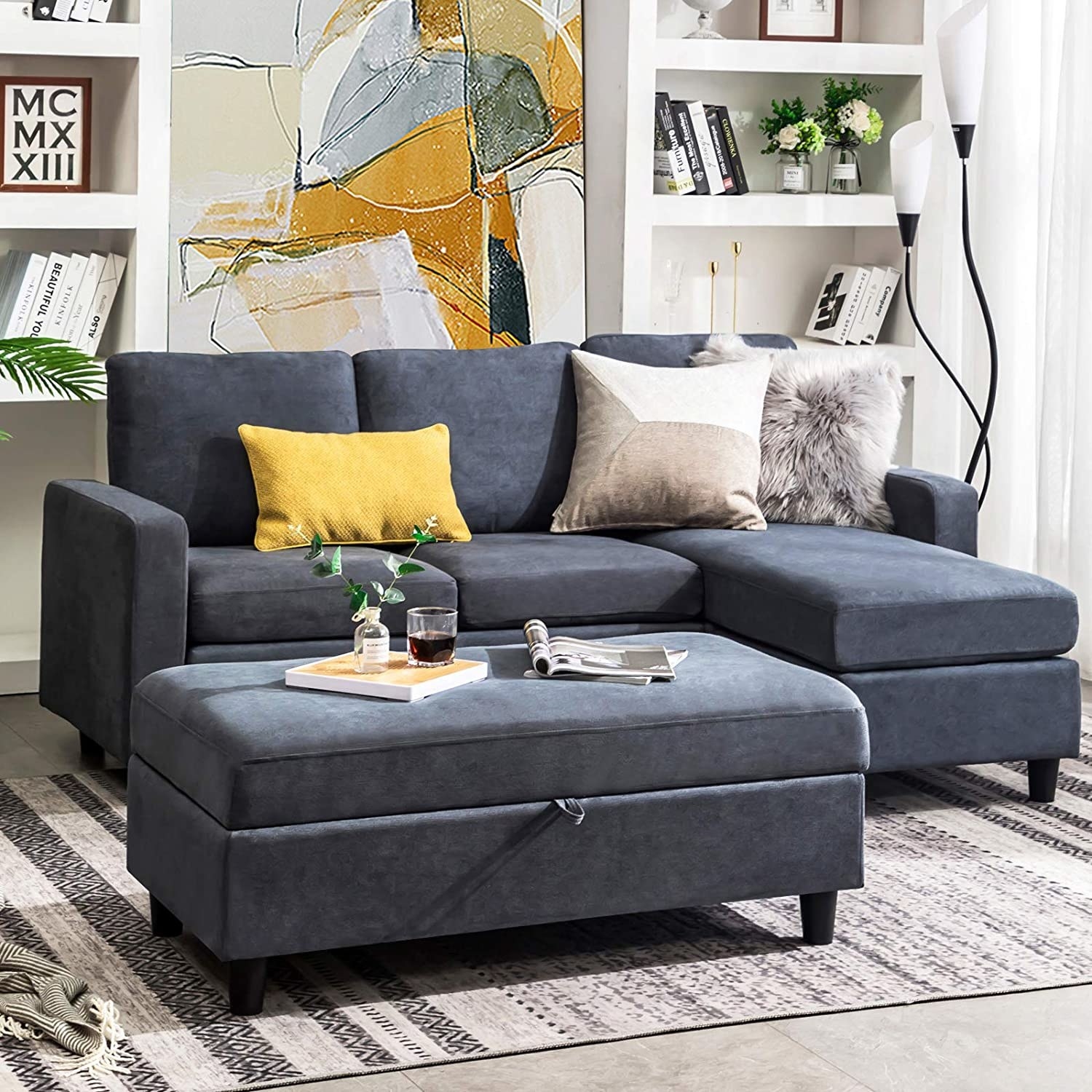 bluish gray three-seat sectional sofa with an extra ottoman