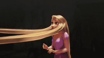 Mother Gothel pulling Rapunzel&#x27;s hair in Tangled