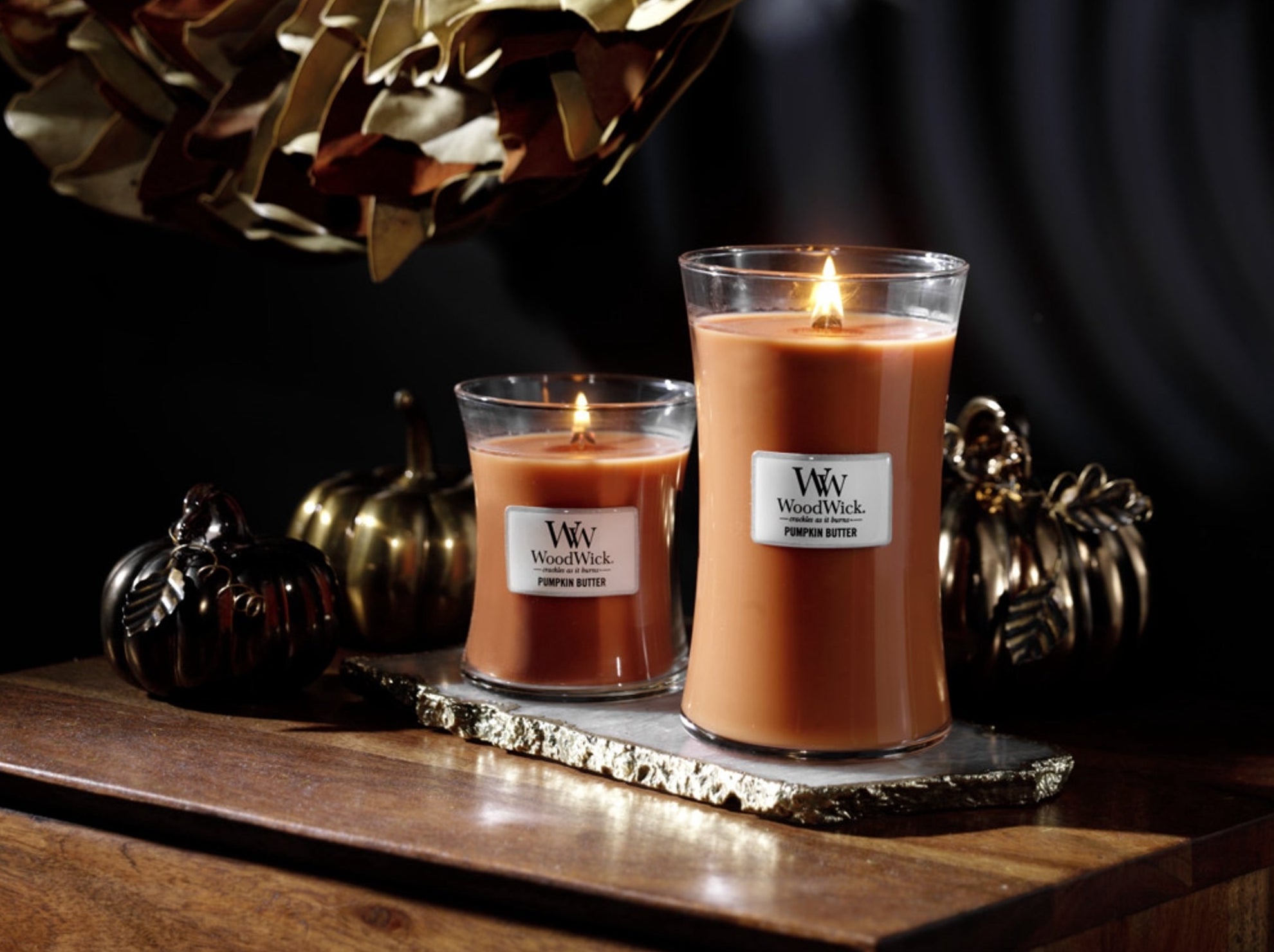 The medium and large pumpkin butter candles
