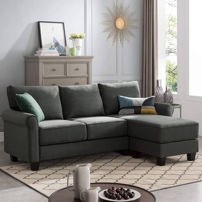 green/gray three seat reversible sectional