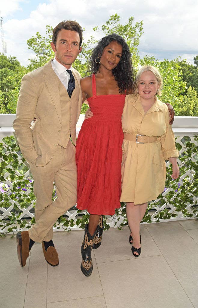 Jonathan, Simone, and Nicola Coughlan posing together at an event