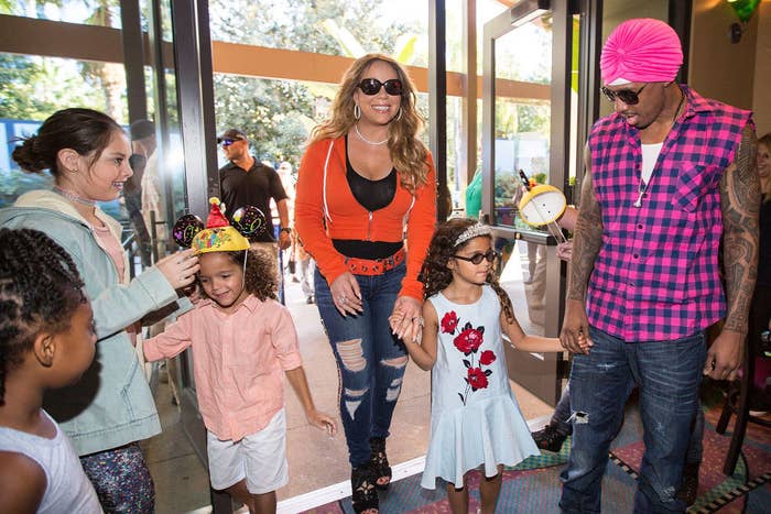 Nick with Mariah and their children