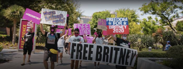 People marching with &quot;Free Britney&quot; posters