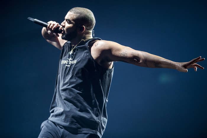 Drake performing onstage