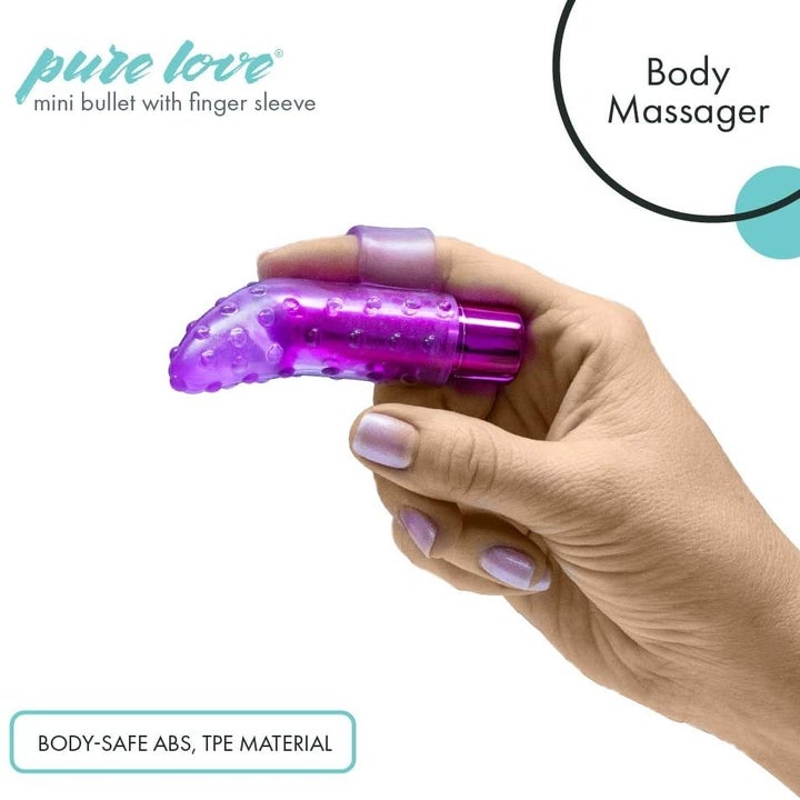 A model using the pointed vibrator on their finger