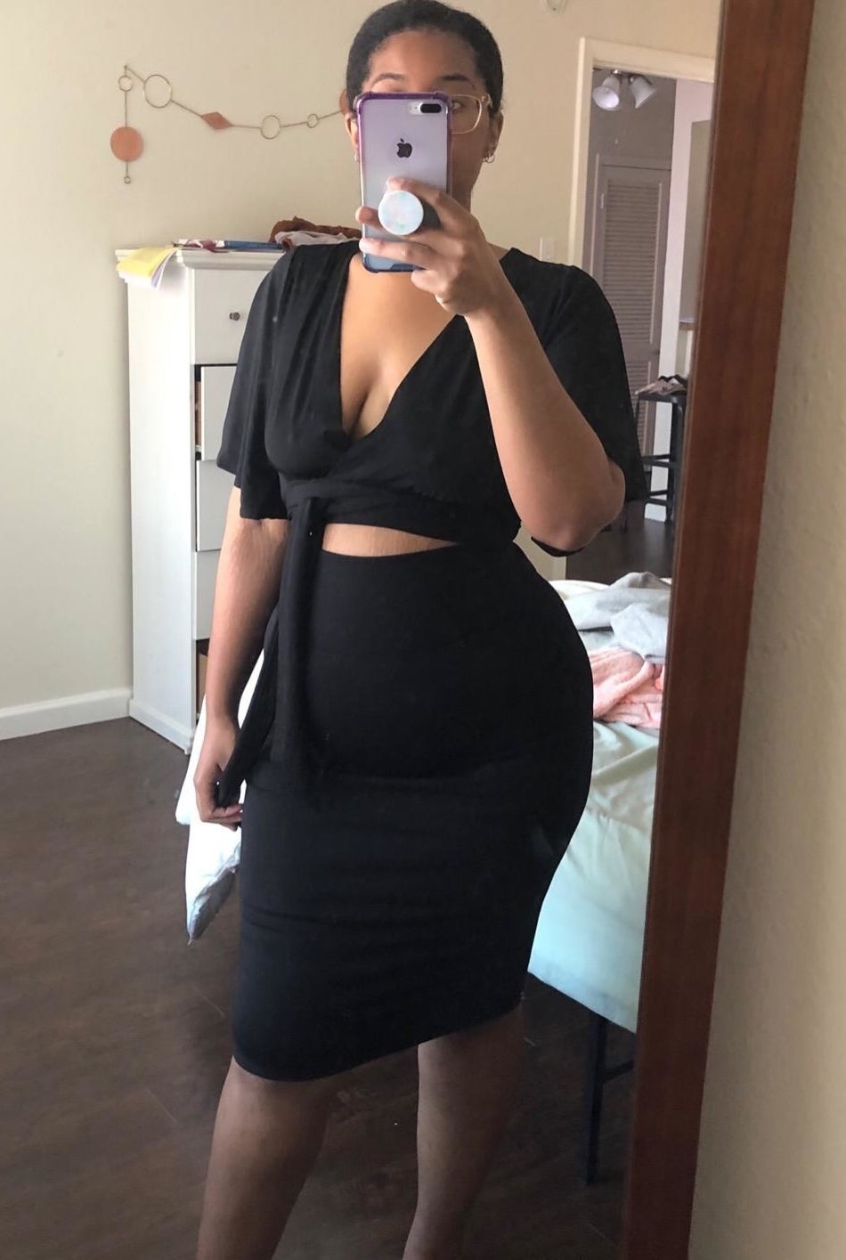Reviewer wearing black skirt
