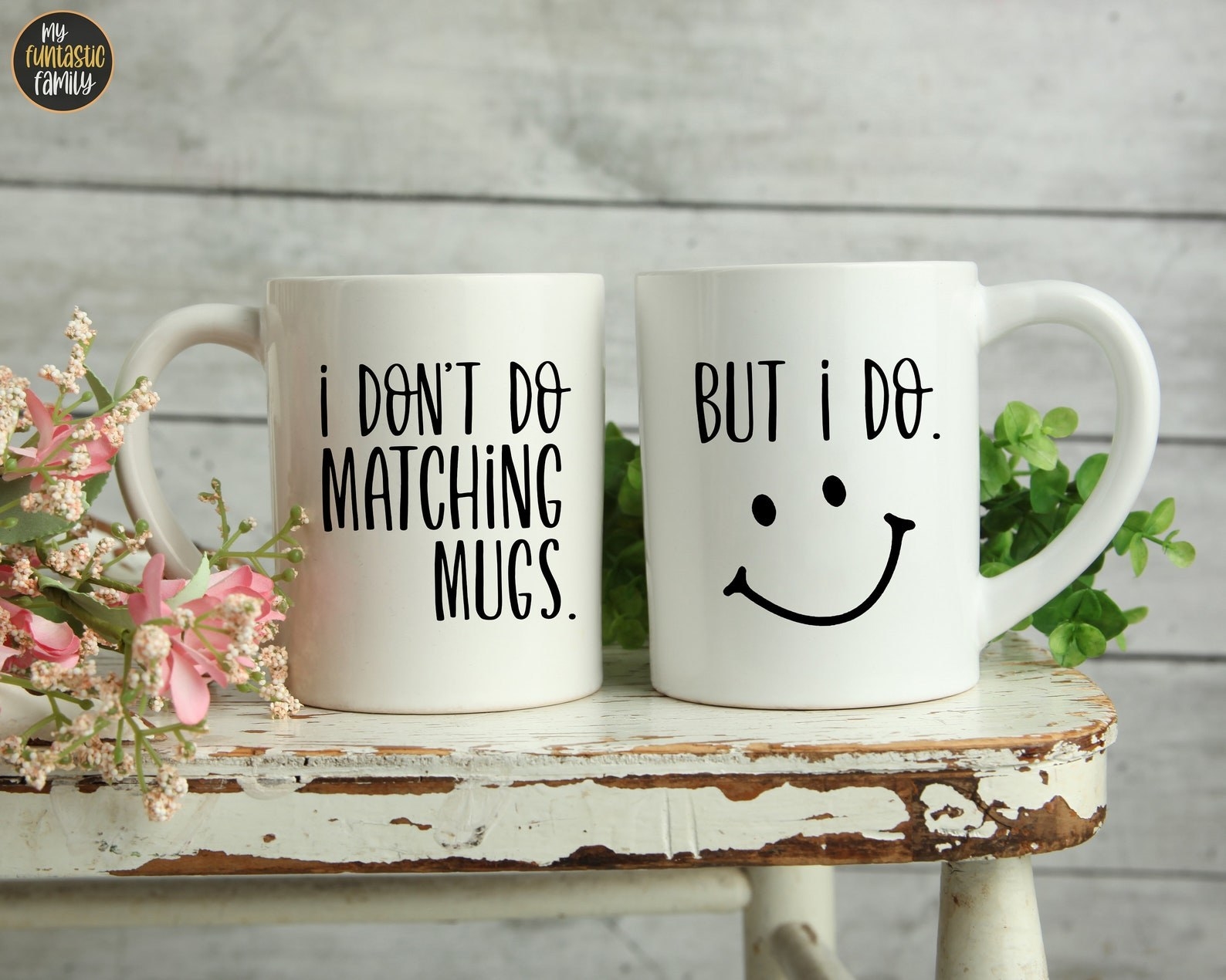 the pair of couples matching mugs on a white wooden table