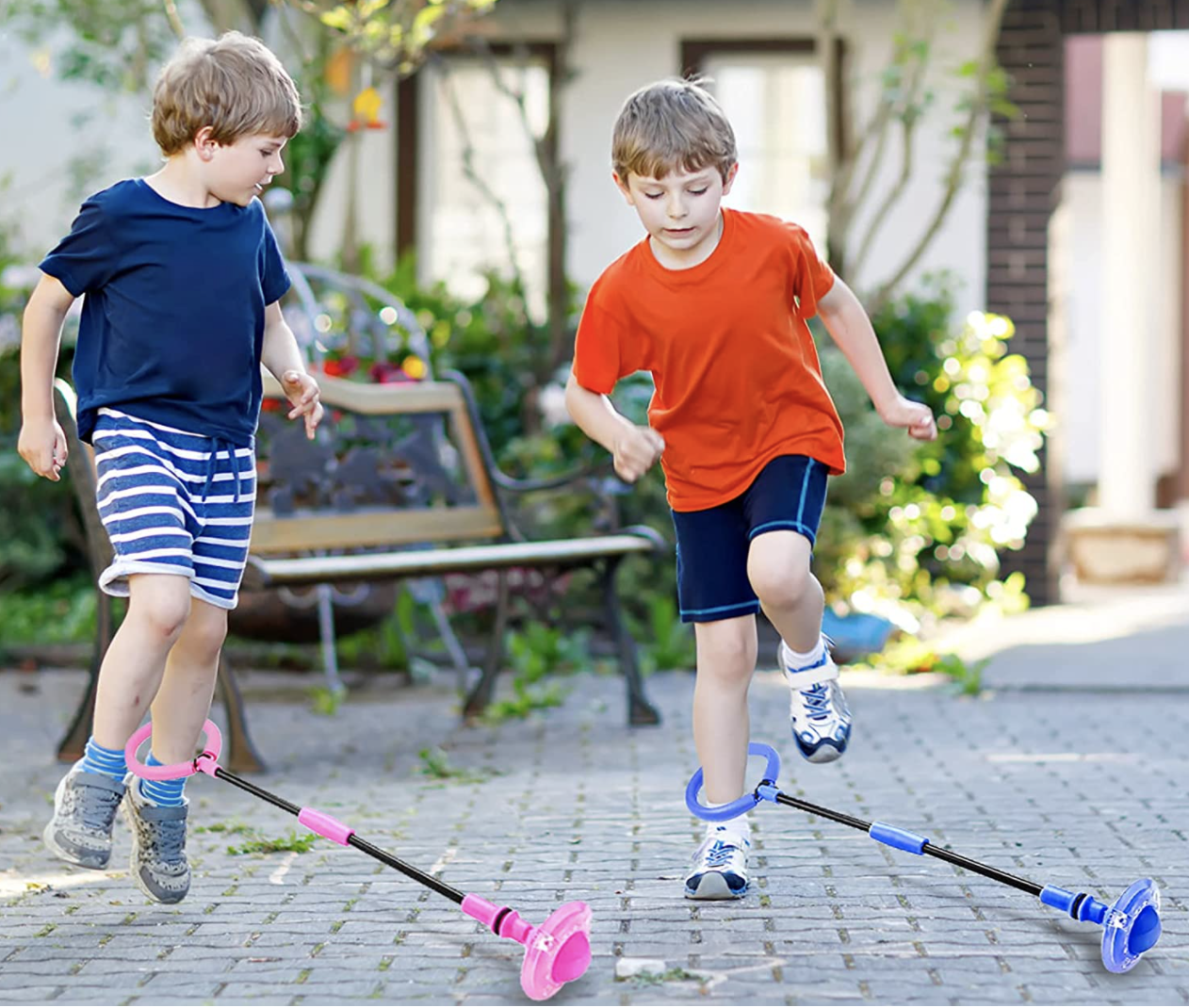 children with pink and blue Skip It-like toys around their ankles
