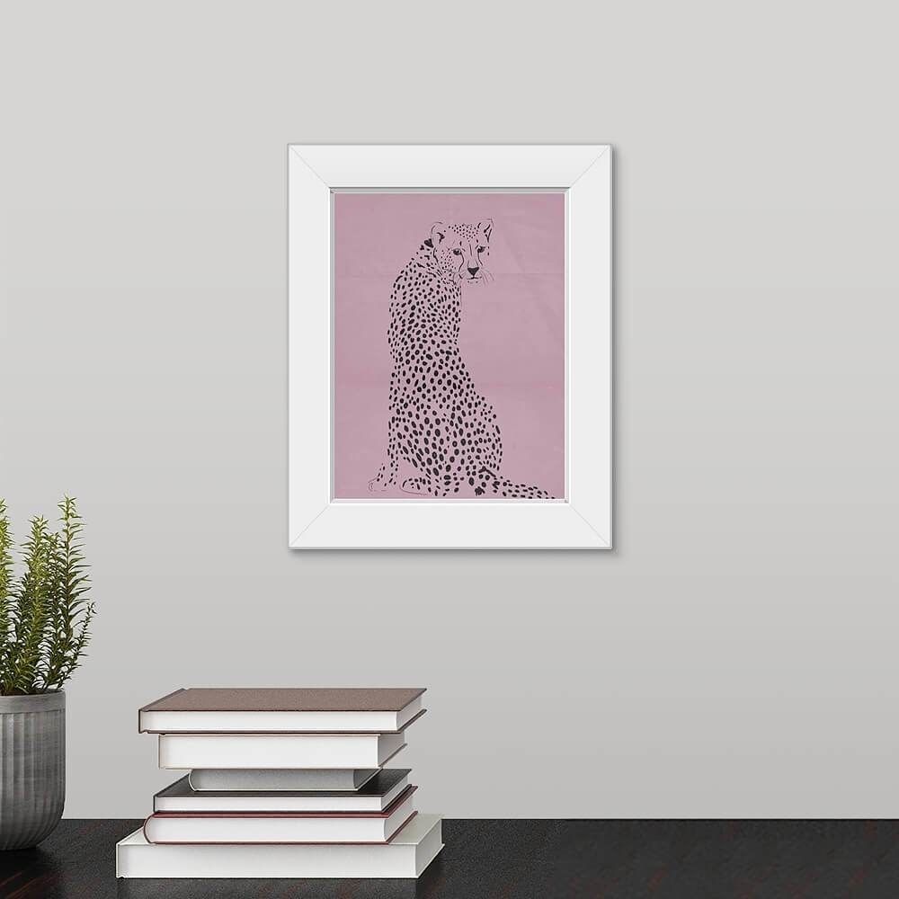 wall art of a cheetah on a pink background