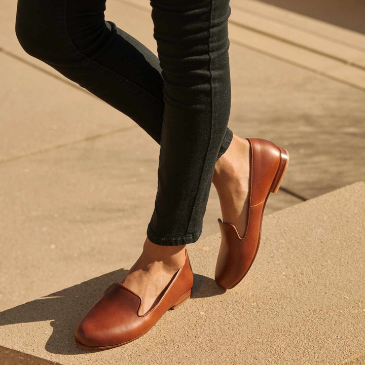 model wearing brown leather smoking shoes