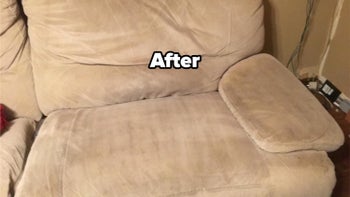 a reviewer photo of the same couch with the stain removed 