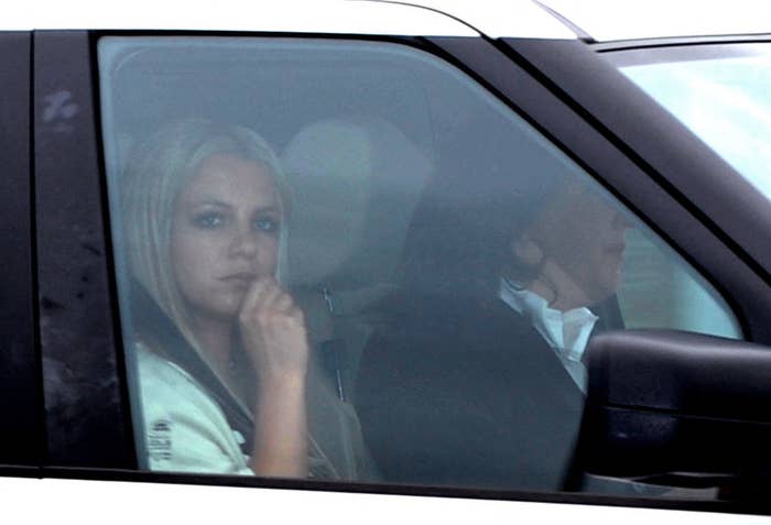 Britney looking out the window as she sits in the front passenger&#x27;s seat