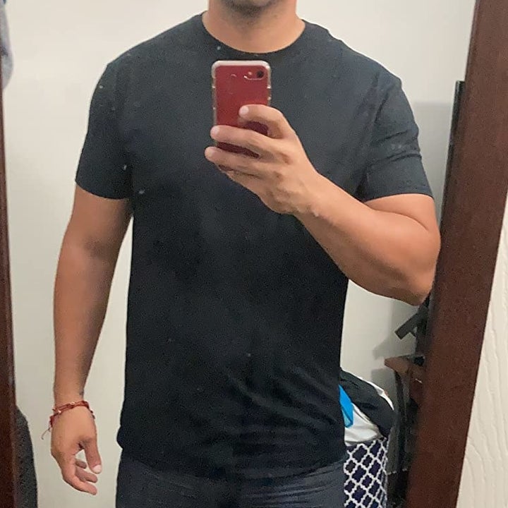 Reviewer wearing black t-shirt