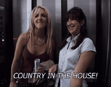 Britney standing next to Fe and saying &quot;Country in the house!&quot;
