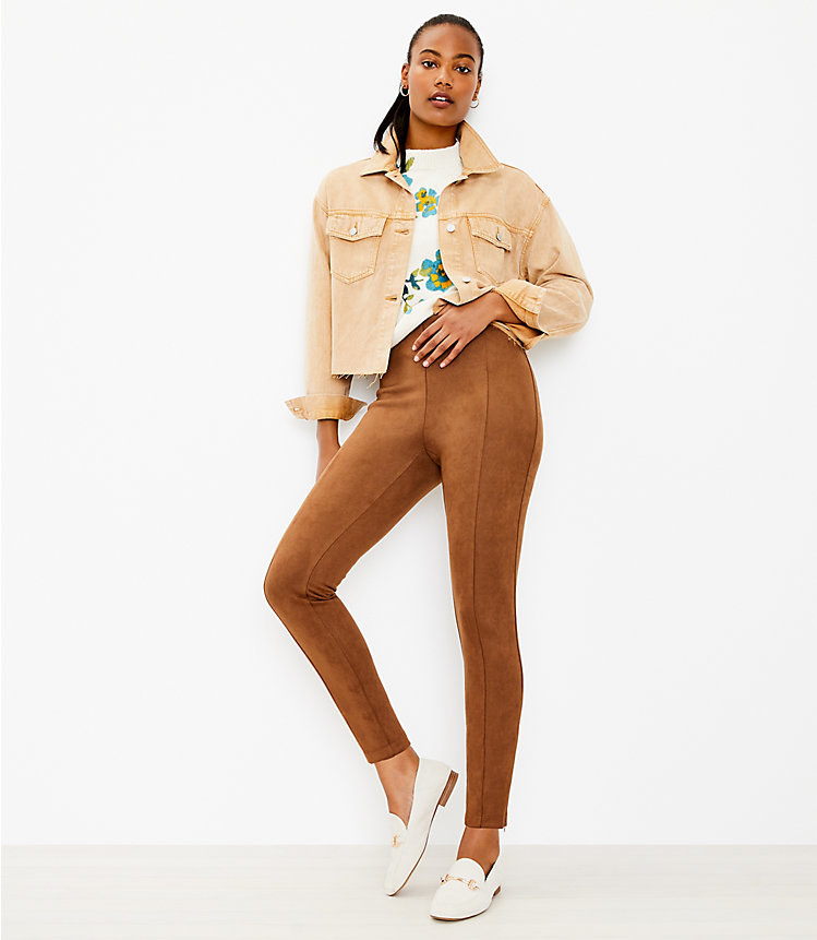 model in brown seamed leggings