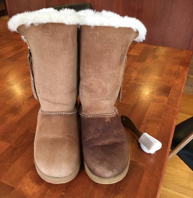Ugg boots side by side and one boot is dark brown and discolored with water stains and the other looks clean and new