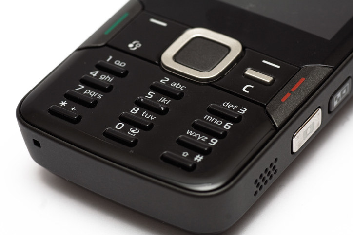 keypad of a black candy bar style mobile phone