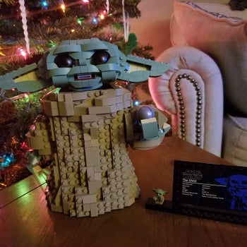 Reviewer's photo of grogu with it's mouth open