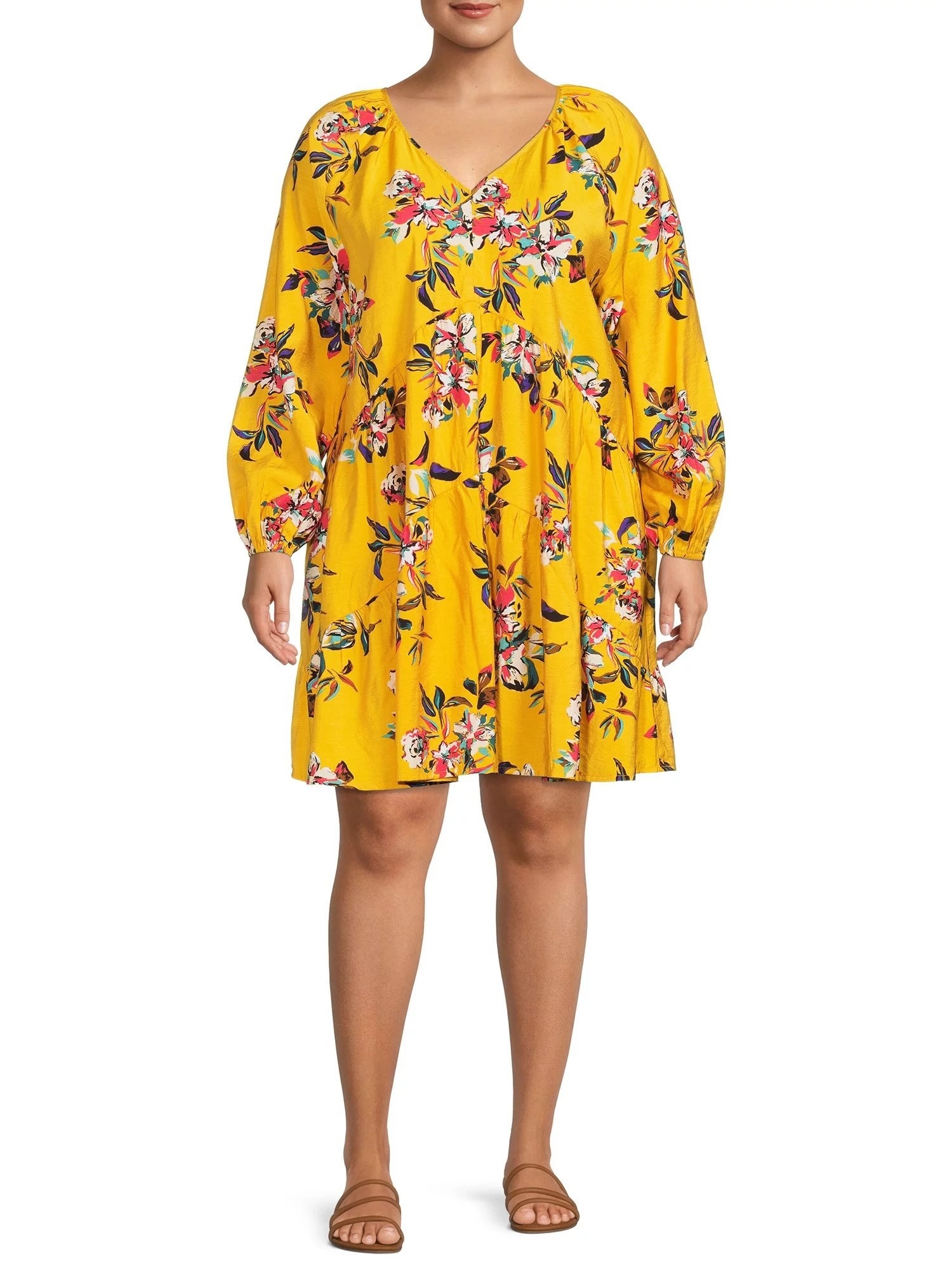Model wearing the floral dress in yellow