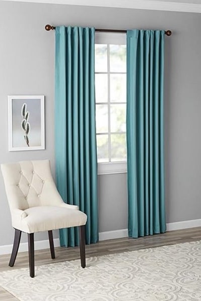 the curtains in teal
