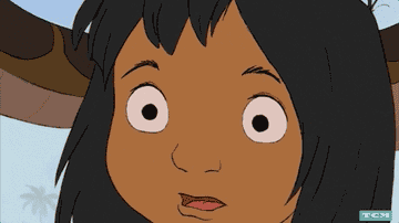A gif of Mowgli from A Jungle Book being mesmerized by the snake