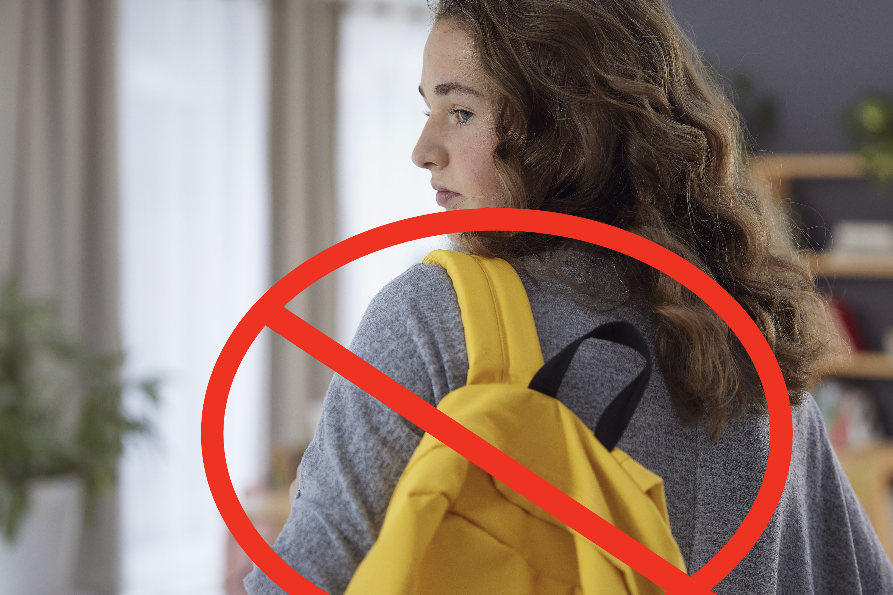School bans pupils from carrying 'inappropriate' designer handbags