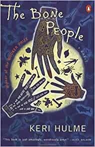 A black book cover with a yellow glowing light in the centre with three hands reaching out towards it.