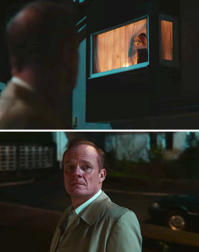 Adam looking at his dad through his window