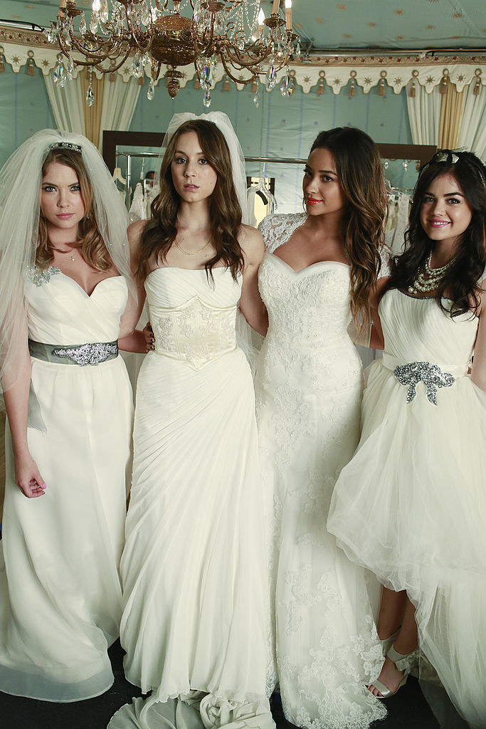 all four girls wearing custom wedding dresses