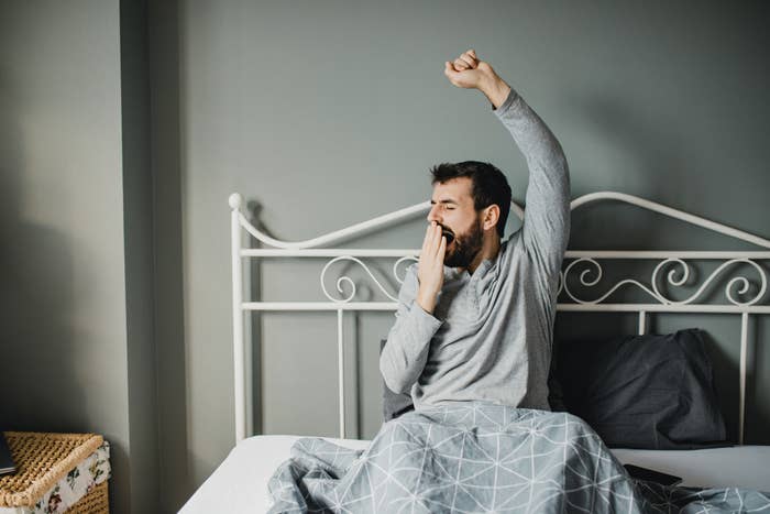 Person yawning and stretching