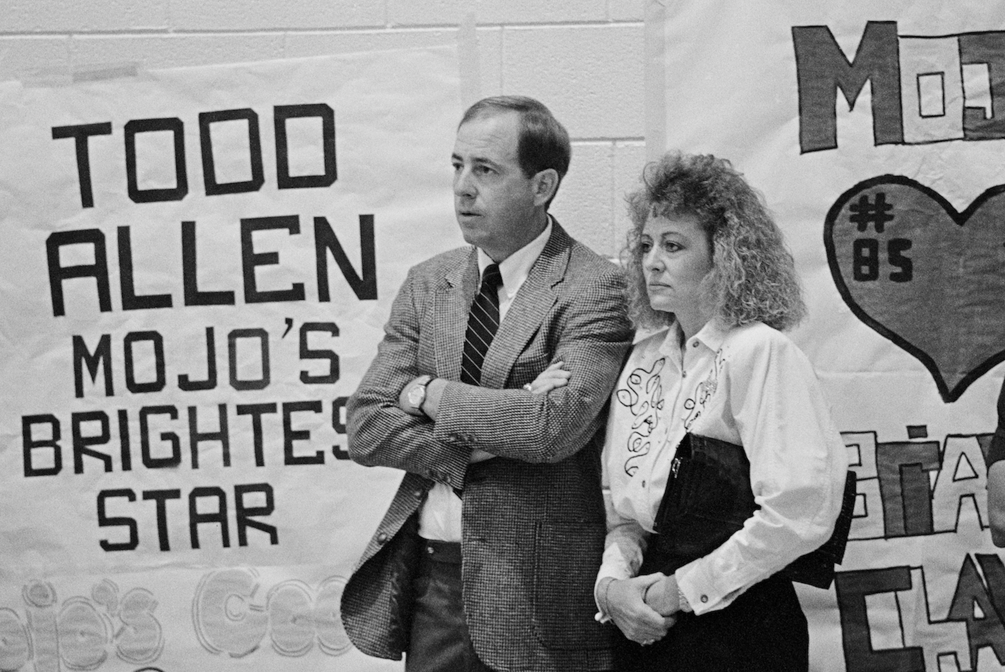 A man and a woman stand next to lettering: &quot;Todd Allen Mojo&#x27;s Brightest Star&quot;