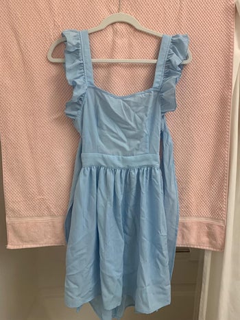 reviewer's wrinkled dress