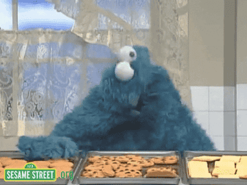 Cookie Monster from &quot;Sesame Street eating a bunch of cookies&quot;