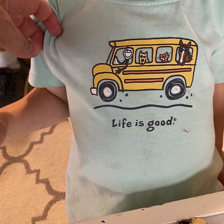 Reviewer's after photo showing their child's clean shirt after using the stain remover