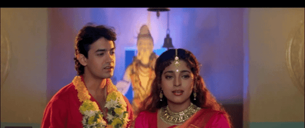 GIF showing Aamir Khan marrying Juhi Chawla and then being woken from a dream